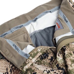 The fit is athletic with tapered legs and a low-profile waist that won’t bunch or chafe under a pack.